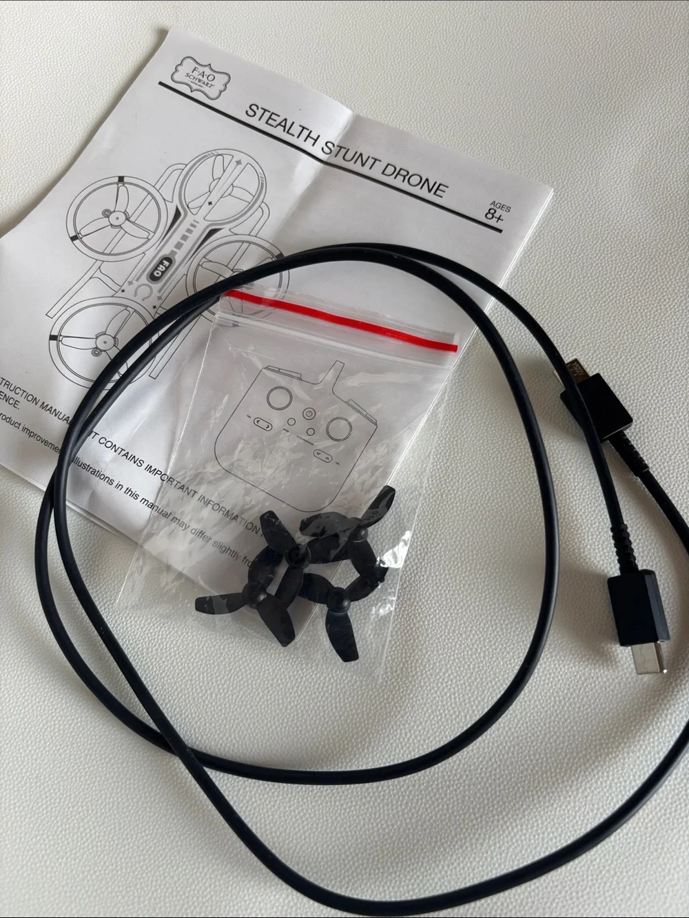 FAO Schwarz Red Stealth Stunt Mini Drone with Controller